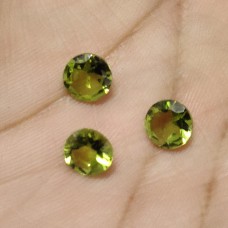 Peridot 7mm round facet  1.13 cts